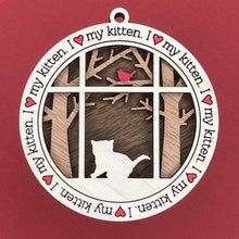 Load image into Gallery viewer, Share the love for our furry friends with these beautiful cat ornaments!  100 different options available.  Send us the name you'd like personalized on it & we'll add it to your ornament.  Our standard background is the trees with the cardinal in them.  If you'd like a different background, please contact us.