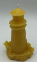 Load image into Gallery viewer, Lighthouse design all natural beeswax candle. Handmade in the USA. This Lighthouse beeswax candle takes you back to the sea & promises to bring images of the seashore to your dreams. Perfect for nautical or coastal themed decor or as a gift to the beach lover in your life. Allow this stunning candle to envelop your room in a warm glow with a sweet honey aroma.