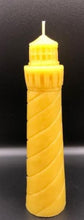 Load image into Gallery viewer, Evoke the beauty of the beach all year long with my 100% beeswax Lighthouse candle. This candle would look great in a nautical themed living space or even a home office. When lit, each candle emits the rich scent of honey and gives off an alluring glow. Perfect as a gift for the beach lover in your life. Bring a bit of the sea to them!