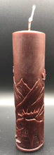 Load image into Gallery viewer, Moose nature scene beeswax candle with mountains, leaves, birds, a stream and the wilderness in the background.