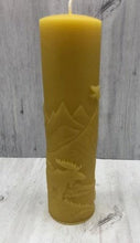 Load image into Gallery viewer, Moose nature scene beeswax candle with mountains, leaves, birds, a stream and the wilderness in the background.