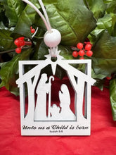 Load image into Gallery viewer, This beautiful Nativity Scene ornament with the verse &#39;Unto us a Child is Born&#39; is sure to bring the true meaning Christmas to your Holiday decor this year.  Also makes a perfect gift or for gift exchanges.
