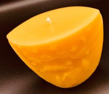 Load image into Gallery viewer, Oval all natural beeswax candle with Santa and his reindeer flying over a house in the woods. Pine tree design adorns the edges of the candle. Handmade in the USA.