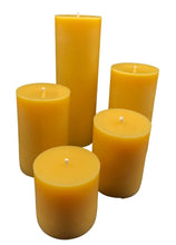 Load image into Gallery viewer, Classic 3" round beeswax pillar candles, available in 5 sizes. These bright glowing pillars will fill the air with a natural hint of warm, fresh honey, purifying your air all the while. A favorite for housewarming gifts, these handmade candles are perfect for your needs and have a very long burn time!