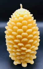 Load image into Gallery viewer, Settle into fall with this pinecone beeswax candle! Made with pure beeswax, this decorative candle makes for perfect fall decor, front porch decor, a housewarming gift, or even a nice choice for some fall wedding decor! Homemade candles are sure to add some charm and create a warm atmosphere in your space. When burned, this candle leaves a wonderful and natural hint of a sweet honey aroma -- completely natural! No fragrance added. Just as nature intended :)