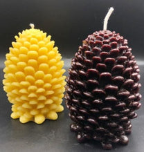 Load image into Gallery viewer, Settle into fall with this pinecone beeswax candle! Made with pure beeswax, this decorative candle makes for perfect fall decor, front porch decor, a housewarming gift, or even a nice choice for some fall wedding decor! Homemade candles are sure to add some charm and create a warm atmosphere in your space. When burned, this candle leaves a wonderful and natural hint of a sweet honey aroma -- completely natural! No fragrance added. Just as nature intended :)