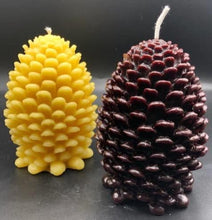 Load image into Gallery viewer, Settle into fall with this pinecone beeswax candle! Made with pure beeswax, this decorative candle makes for perfect fall decor, front porch decor, a housewarming gift, or even a nice choice for some fall wedding decor! Homemade candles are sure to add some charm and create a warm atmosphere in your space. When burned, this candle leaves a wonderful and natural hint of a sweet honey aroma -- completely natural! No fragrance added. Just as nature intended :)