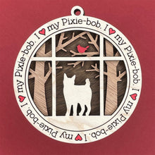 Load image into Gallery viewer, Share the love for our furry friends with these beautiful cat ornaments!  100 different options available.  Send us the name you'd like personalized on it & we'll add it to your ornament.  Our standard background is the trees with the cardinal in them.  If you'd like a different background, please contact us.