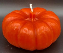 Load image into Gallery viewer, This 100% pure beeswax Pumpkin candle will get you ready for changing leaves, crisp mornings and radiant, crackling fires. Enjoy the sweet natural aroma and gentle glow of a beeswax candle. Make a lovely Thanksgiving or holiday centerpiece display when paired with other natural elements.