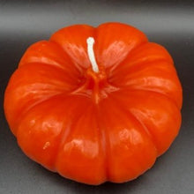Load image into Gallery viewer, This 100% pure beeswax Pumpkin candle will get you ready for changing leaves, crisp mornings and radiant, crackling fires. Enjoy the sweet natural aroma and gentle glow of a beeswax candle. Make a lovely Thanksgiving or holiday centerpiece display when paired with other natural elements.
