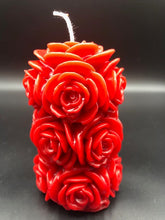 Load image into Gallery viewer, 4 1/4" Rose Beeswax Candle. This beeswax candle is decorated with roses carved into the sides and top of the candle.