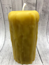 Load image into Gallery viewer, Rustic Beeswax Pillar candle with wax drip pattern flowing down the sides.
