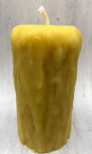 Load image into Gallery viewer, Rustic Beeswax Pillar candle with wax drip pattern flowing down the sides.
