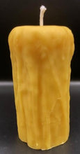 Load image into Gallery viewer, Rustic Beeswax Pillar candle with wax drip pattern flowing down the sides.