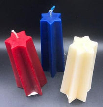 Load image into Gallery viewer, These red, white & blue Shooting Star Beeswax Candles are sure to be a hit at your holiday party. Light up the 4th of July, add that needed splash of color to your centerpiece & wow your guest with these incredible shooting star candles. Available in 3 sizes.