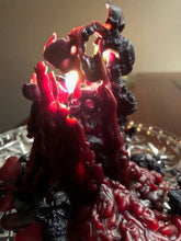 Load image into Gallery viewer, Creepy bleeding skull candle leaks red bloody colored wax as it burns.  Piles of skulls and bone images make up this pillar-like candle.  This custom made cryptic, gothic candle is great for Halloween decorations, gifts for skull loving friends, gothic decor, fall decor or just scary decor.