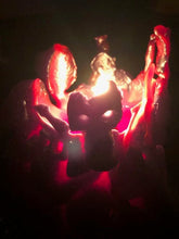 Load image into Gallery viewer, Creepy bleeding skull candle leaks red bloody colored wax as it burns.  Piles of skulls and bone images make up this pillar-like candle.  This custom made cryptic, gothic candle is great for Halloween decorations, gifts for skull loving friends, gothic decor, fall decor or just scary decor.