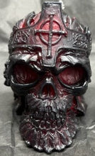 Load image into Gallery viewer, This creepy skull with cross crown beeswax candle is sure to be a hit with your goth or Halloween loving friends.  Adds the perfect touch to Halloween decor.  This cryptic, gothic candle is great for Halloween decorations, gifts for skull loving friends, gothic decor, fall decor or just scary decor.