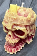Load image into Gallery viewer, This creepy skull with cross crown beeswax candle is sure to be a hit with your goth or Halloween loving friends.  Adds the perfect touch to Halloween decor.  This cryptic, gothic candle is great for Halloween decorations, gifts for skull loving friends, gothic decor, fall decor or just scary decor.