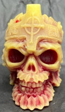 Load image into Gallery viewer, This creepy skull with cross crown beeswax candle is sure to be a hit with your goth or Halloween loving friends.  Adds the perfect touch to Halloween decor.  This cryptic, gothic candle is great for Halloween decorations, gifts for skull loving friends, gothic decor, fall decor or just scary decor.