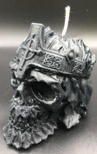 Load image into Gallery viewer, Creepy, ornate skull beeswax candle with cross crown. Eyes glow after it starts to burn down.