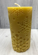 Load image into Gallery viewer, Beautiful Snowflake designs glow when you light this amazing Snowflake Beeswax Pillar Candle.  Also available in a 3" version.