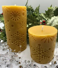 Load image into Gallery viewer, Beautiful Snowflake designs glow when you light this amazing Snowflake Beeswax Pillar Candle.  Also available in a 3" version.