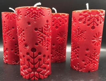 Load image into Gallery viewer, Beautiful Snowflake designs glow when you light this amazing Snowflake Beeswax Pillar Candle. Also available in a 3" version.