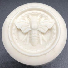 Load image into Gallery viewer, Cute little round bar of soap with bee image on top. Oats gently exfoliate your skin as the hydrating soap blend softens skin. The moisturizing oils used in our soaps produce a rich luxurious lather that leaves your skin clean & soft without stripping the natural oils. Perfect for Valentine's Day gifts, Christmas gifts, birthday gifts, wedding shower gifts, Mother's Day gifts & more!