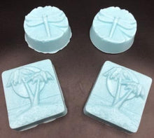 Load image into Gallery viewer, Ocean themed designs for our Ocean Breeze scented soaps. Blue palm trees by the beach and dragonfly designs pictures. Fresh ocean breeze scent takes you right back to the tropics as it soothes & cleanses your skin. The moisturizing oils used in our soaps produce a rich luxurious lather that leaves your skin clean & soft without stripping the natural oils. Perfect for Valentine's Day gifts, Christmas gifts, birthday gifts, wedding shower gifts, Mother's Day gifts & more!