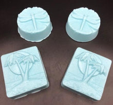 Load image into Gallery viewer, Wisk your loved one away to the sea with this beach inspired Ocean Breeze Seashell Gift Basket. Imaging the soothing scent of our Ocean Breeze soaps transporting you right back to the beach with your toes in the sand. The calming herbs in our Tranquili-Tea will relax your cares away as you dream of days by the ocean. Ocean Breeze Seashell Gift Basket is packaged and ready to go for your gift giving needs.