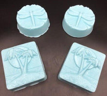 Load image into Gallery viewer, Imagine the soft sand beneath your feet as the soft glow of our beeswax candle relaxes your stresses away.  The lingering scent of our Ocean Breeze Soaps tantalize your senses to make the dream complete.  Our Seaside Gift Basket is sure to impress anyone on your gift list.  Great for birthday gifts, Christmas gifts or just to let someone know you're thinking of them.