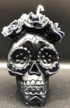 Load image into Gallery viewer, Celebrate the Day of the Dead, All Souls Day or All Saints Day with these adorable Sugar Skull Beeswax Candles.  Many cultures believed that the gates of heaven are opened at midnight on October 31, and the spirits of all deceased children (angelitos) are allowed to reunite with their families for 24 hours. On November 2, the spirits of the adults come down to enjoy the festivities that are prepared for them.  Families celebrate the lives of their departed loved ones.