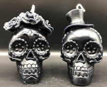 Load image into Gallery viewer, Celebrate the Day of the Dead, All Souls Day or All Saints Day with these adorable Sugar Skull Beeswax Candles.  Many cultures believed that the gates of heaven are opened at midnight on October 31, and the spirits of all deceased children (angelitos) are allowed to reunite with their families for 24 hours. On November 2, the spirits of the adults come down to enjoy the festivities that are prepared for them.  Families celebrate the lives of their departed loved ones.