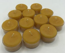 Load image into Gallery viewer, Timeless, classic tealight candles. With a long burn time, you can illuminate any space you'd like with the warm glow of these adorable candles. These make great gifts or souvenirs, especially for any nature lovers that you know. These are completely beeswax, nothing added. Your package will burst with a delicious explosion of warm and sweet honey scent as soon as you open it.  Great for use in worship, prayer, meditation, at an alter, rituals, showers, weddings or just to pamper yourself.