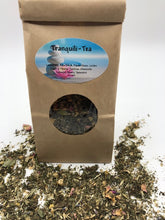 Load image into Gallery viewer, Wisk your loved one away to the sea with this beach inspired Ocean Breeze Seashell Gift Basket. Imaging the soothing scent of our Ocean Breeze soaps transporting you right back to the beach with your toes in the sand. The calming herbs in our Tranquili-Tea will relax your cares away as you dream of days by the ocean. Ocean Breeze Seashell Gift Basket is packaged and ready to go for your gift giving needs.