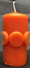 Load image into Gallery viewer, Moon Phase Beeswax Candle depicting the triple Goddess. Bring a bit of magic into your life with this amazing candle! Orange Moon Phase / Triple Goddess Beeswax Candle