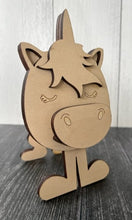 Load image into Gallery viewer, Keep your glasses within reach with our adorable Unicorn Eyeglass Holder. Add whimsical magic to your room & keep your glasses safe. This Unicorn Eyeglass Holder has a fluffy mane coming down her forehead and a star on her tail.