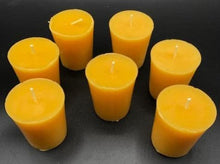 Load image into Gallery viewer, Indulge in these 100% natural, sweet honey-scented beeswax votive candles. These handmade candles are made with nothing but pure beeswax and burn for at many hours each. They may be little, but they pack a bright-glowing punch.