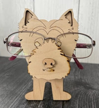 Load image into Gallery viewer, Let his adorable little dog keep your eyeglasses safe while you sleep.  Glasses rest across the dog's nose.  These Eyeglass holders are a MUST for children & adults alike.  Keep your glasses safe from scratches.  Also makes a great gift!
