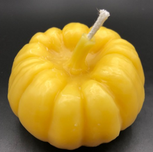 Load image into Gallery viewer, Settle into fall with this pumpkin beeswax candle! Made with pure beeswax, this decorative candle makes for perfect fall decor, front porch decor, a housewarming gift, Halloween decor, Thanksgiving decor or even a nice choice for some fall wedding decor! Homemade candles are sure to add some charm and create a warm atmosphere in your space. When burned, this candle leaves a wonderful and natural hint of a sweet honey aroma -- completely natural! No fragrance added. Just as nature intended :)