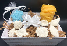 Load image into Gallery viewer, Our Ocean Dreams Gift Basket is filled with soaps and a Whale Beeswax Candle that transport you right back to the beach while you watch the waves &amp; the whales breach.  Imagine the soft sand beneath your feet as the soft glow of our beeswax candle relaxes your stresses away.  The lingering scent of our Ocean Breeze Soaps tantalize your senses to make the dream complete.   Ocean Dreams Gift Basket all packaged ready for your gift giving needs. Perfect for birthday gifts, Christmas gifts or just to let someone
