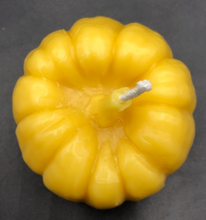 Load image into Gallery viewer, Settle into fall with this pumpkin beeswax candle! Made with pure beeswax, this decorative candle makes for perfect fall decor, front porch decor, a housewarming gift, Halloween decor, Thanksgiving decor or even a nice choice for some fall wedding decor! Homemade candles are sure to add some charm and create a warm atmosphere in your space. When burned, this candle leaves a wonderful and natural hint of a sweet honey aroma -- completely natural! No fragrance added. Just as nature intended :)