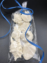 Load image into Gallery viewer, Adorable seashell oatmeal soaps will bring a touch of the sea into your home.  Available in unscented or Ocean Breeze scent.  The moisturizing oils used in our soaps produce a rich luxurious lather that leaves your skin clean & soft without stripping the natural oils.  Perfect for Valentine's Day gifts, Christmas gifts, birthday gifts, wedding shower gifts, Mother's Day gifts & more!