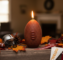 Load image into Gallery viewer, Kick off football season in style with this Football Beeswax Candle, handcrafted from 100% pure beeswax. Whether you’re decorating for game day, hosting the ultimate tailgate, celebrating the big championship game, or searching for the perfect gift for your favorite football fan, this unique candle is sure to be a touchdown!
