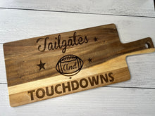 Load image into Gallery viewer, Tailgates and Touchdowns Charcuterie Board with picture of football in the center.  
