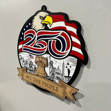 Load image into Gallery viewer, Celebrate America’s 250th Anniversary with this stunning layered laser cut sign, a patriotic tribute to the spirit, strength, and history of the United States. Featuring a majestic bald eagle soaring over a flowing American flag, this eye-catching piece also includes a beautifully engraved scene showcasing iconic American landmarks and heritage-inspired details. 

