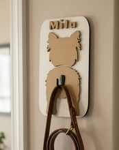 Load image into Gallery viewer, Keep your dog’s essentials organized while adding a personalized touch to your home with this custom dog leash holder. Featuring your dog’s breed silhouette and personalized name, each leash holder is precision laser cut from premium maple plywood and individually hand-painted, making every piece a unique keepsake for your favorite four-legged friend.
