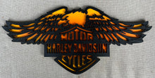 Load image into Gallery viewer, A black wooden Harley wings  wall sign with orange 
