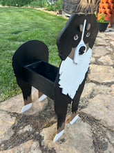 Load image into Gallery viewer, Celebrate the gentle, loyal spirit of this beloved breed with our Bernese Mountain Dog Planter Box Decor—a heartwarming statement piece that’s perfect for welcoming guests to your home. With its signature tri-color markings and sweet expression, this handcrafted planter captures the charm of the Bernese Mountain Dog beautifully.
